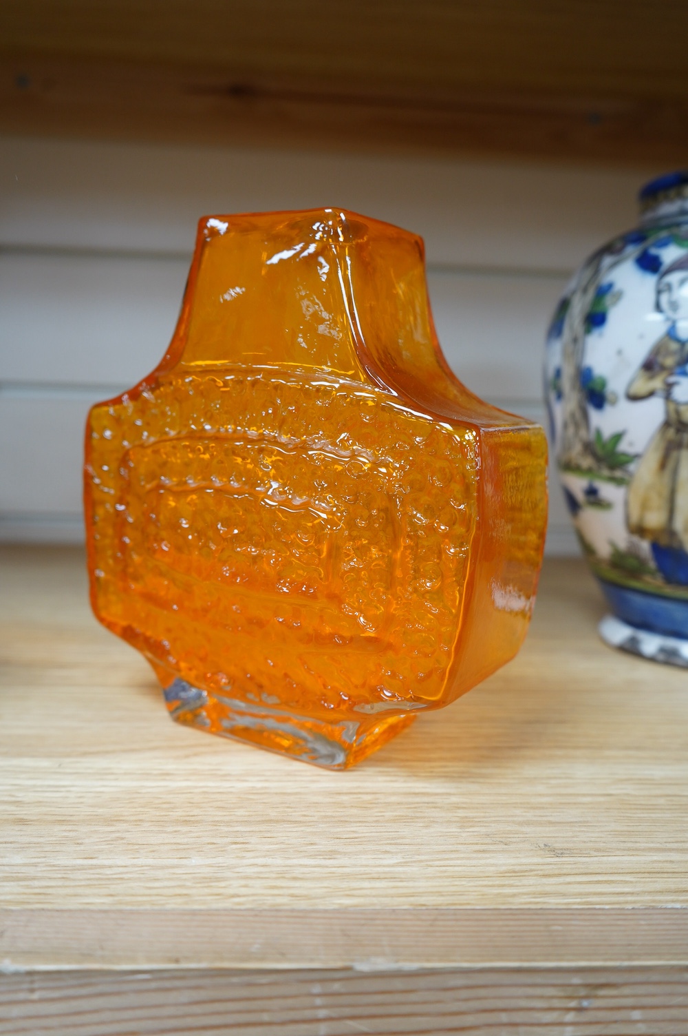 A Whitefriars tangerine glass 'TV' vase, 18cm. Condition - good